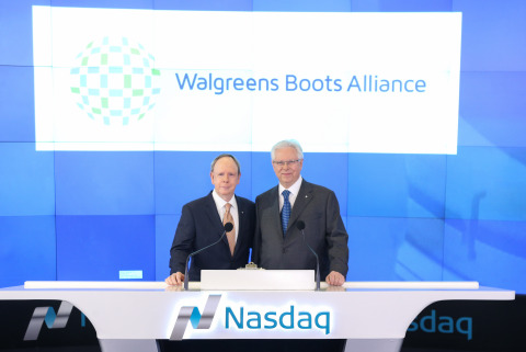 Executive Chairman Jim Skinner (left) and Executive Vice Chairman Stefano Pessina celebrate the first week of Walgreens Boots Alliance as a new public company at Nasdaq's opening bell ceremony on 9 January 2015. (C) 2015, The NASDAQ OMX Group, Inc.