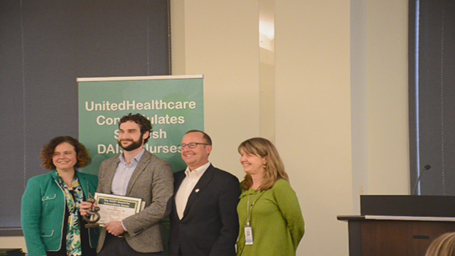 Melissa Barnes, vice president, The DAISY Foundation, and David Hansen, UnitedHealthcare's regional president of network management - West region, present The DAISY Award to Jessee Kilgren, RN, at a special ceremony today at Swedish Medical Center in Seattle (Video: Landen Zumwalt).