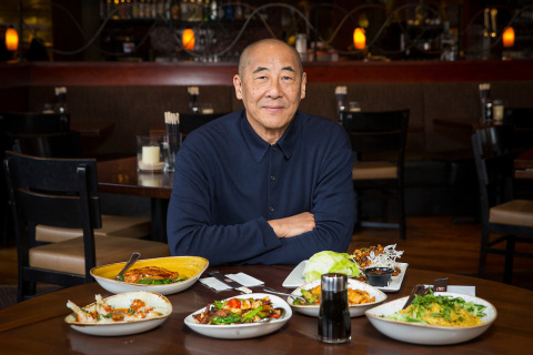 Philip Chiang displays the Chinese New Year menu at P.F. Chang's (Photo: Business Wire)