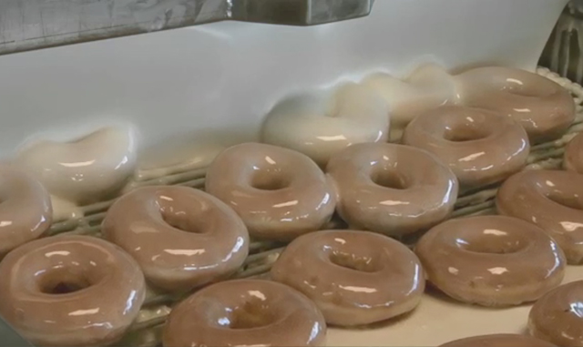 Video of Krispy Kreme's signature Original Glazed being made and glazed.