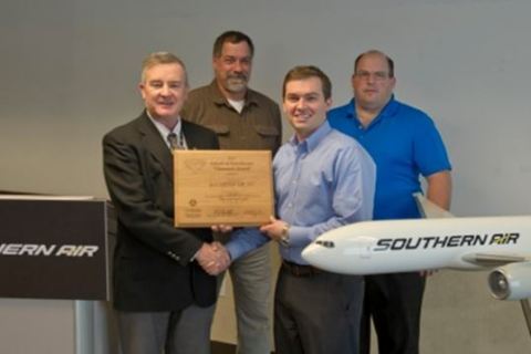 Paul Chase, Vice President of Systems Operations at Southern Air, Nils Johnson, Director of Maintenance for Southern Air, and Jerry Wolfgang, Director of Quality Control for Southern Air, receive the Diamond Award of Excellence from Mark Little, Principal Maintenance Inspector for the FAA. (Photo: Business Wire)