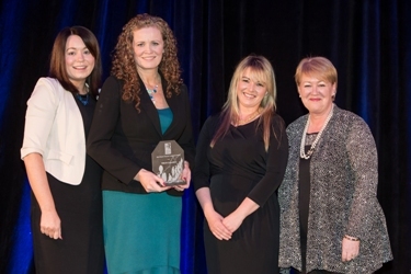 Brenda Dooley, Principle, Shannon Consulting presents the award for Most Effective Employee Engagement Strategy to Hazel Rainey, Joanne McMullan and Breda Donlon, FINEOS Corporation. (Photo: Business Wire)