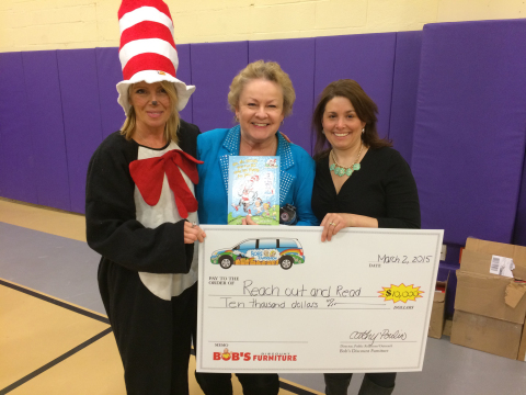 Flanking children's book author Tish Rabe, Reach Out and Read Executive Director of Connecticut Chri ... 