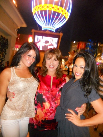 Producer Sandy Sachs, (center) invites you to once again hit “The Strip” with the hottest women from around the world! Girl Bar, in association with Total Rewards by Caesars Entertainment, ignites Sin City with the ultimate lesbian weekend in the most extraordinary venues ever offered, as DINAH Vegas sizzles April 23-26, 2015 in fabulous Las Vegas, Nevada. (Photo: Business Wire)