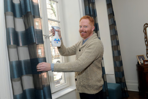 Jesse Tyler Ferguson uses Febreze Fabric Refresher Allergen Reducer, Unscented to reduce inanimate allergens while spring cleaning, Monday, March 23, 2015, in New York. The product is the first in its category to be Certified asthma & allergy friendly by the Asthma and Allergy Foundation of America.  (Photo by Diane Bondareff/Invision for Procter & Gamble/AP Images)