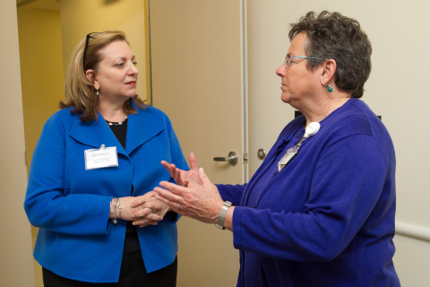 Bernadette Di Re, CEO, UnitedHealthcare Community Plan of Massachusetts (left), talks to Adela Margules, executive director, Bowdoin Street Health Center, at a lunch at Bowdoin Street to recognize UnitedHealthcare's Community Grants Program recipients. UnitedHealthcare donated $130,000 to 24 community health organizations to support access to primary care and other support services for Massachusetts residents. UnitedHealthcare's Community Grants Program helps community-based organizations get the funds they need to continue their important work, and offers free expert guidance to help the organizations make their funding efforts more effective (Photo: Matt Healey).