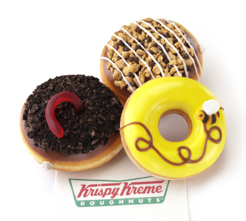 Krispy Kreme is introducing three new campfire-inspired treats perfect for camping in the mountains, or camping out on the couch. The new OREO(R) Dirt Cake Doughnuts, S'mores Doughnuts and Honey Bee Doughnuts are available now through May 17, 2015 at participating Krispy Kreme(R) US locations. (Photo: Business Wire)