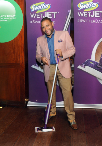 Anthony Anderson strikes a pose with a Swiffer WetJet at the unveiling of the docu-style #SwifferDad video that he helped create, Tuesday, April 14, 2015, in New York. The video celebrates the active role that dads play in sharing cleaning and household responsibilities. (Photo by Diane Bondareff/Invision for Swiffer/AP Images)