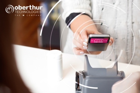 OT extends its wearables offer with a new contactless payment sticker (Photo: Business Wire)