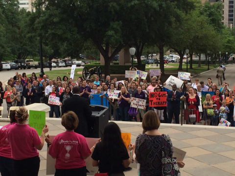 State Representative Sylvester Turner (D-Houston) speaks to a gathering in front of the State Capitol Wednesday about proposed $200 million in budget cuts to the state's Medicaid therapy services for children with disabilities and medically-frail elderly. (Photo: Business Wire)