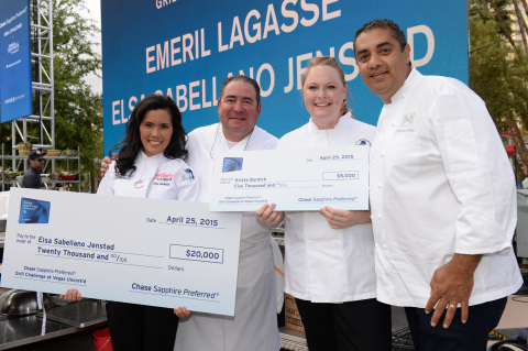 Culinary students Elsa Sabellano Jenstad, left, and Krista Burdick, pose with chefs Emeril Lagasse, left, and Michael Mina at the Chase Sapphire Preferred Grill Challenge during Vegas Uncork'd by Bon Appetit on Saturday, April 25, 2015 in Las Vegas. (Photo by Evan Agostini/Invision for Chase Sapphire Preferred/AP Images)