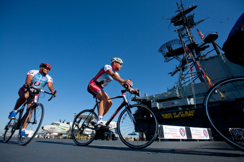 Ulysses Palafox (at left) and Shawn Olin, members of Ride 2 Recovery's Project HERO Balboa, take their new bikes on an inaugural ride. Earlier this morning, UnitedHealthcare presented the veterans organization with 16 bikes to replace those stolen earlier this month from a storage unit in San Diego (Photo: Wally Nell).