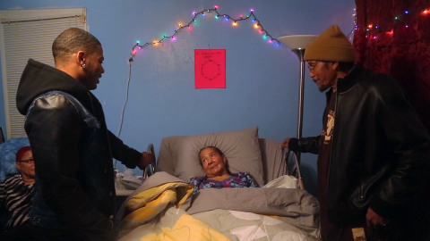 (Hip-hop artist, Nelly sharing a heartfelt moment with his grandmother Verna Elizabeth Haynes and father Cornell Haynes Sr. on hit docu-series "Nellyville" on BET Networks/ Photo Courtesy of BET Networks/Entertainment One)