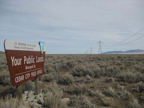 The TransWest Express Transmission Project will use lattice structures and will be located next to existing transmission lines, such as this transmission line in Beaver County, Utah, as much as possible to minimize environmental impacts. Two-thirds of the approximately 730-mile preferred alternative route lies on federal land principally managed by the Bureau of Land Management. (Photo: Business Wire)
