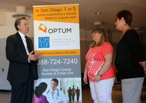 Michael Bailey, M.D., medical director of Optum San Diego (left), discusses issues surrounding mental health and suicide prevention with instructors from Optum who are leading free suicide prevention and mental health training courses in San Diego during Mental Health Awareness Month. In San Diego, one in five adults experience a mental illness in a given year, and one in four young adults ages 18-24 has a diagnosable mental illness. L to R: Bailey; Pamela Binkley, MS, CPRS, Optum; and Dona Dmitrovic, MHS, Optum (Photo: Jamie Scott Lytle).
