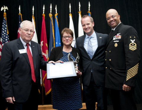 Stephen M. Koper (left), chairman of the Ohio ESGR presents the 'Above and Beyond' award to Paula Deter and Kevin Talley of Advanced Drainage Systems, Inc. as Master Chief CJ Mitchell looks on. The award was given at the ESGR Annual Employer Recognition Award ceremony last month. (Photo by Ohio ESGR)