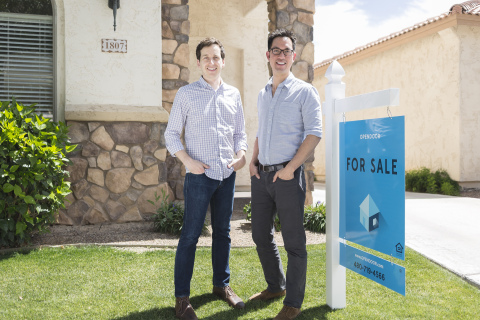 Evan Moore (left), VP of Product, and Eric Wu (right), Co-founder of Opendoor, display a recently listed home in Phoenix, Ariz. (Photo: Business Wire)
