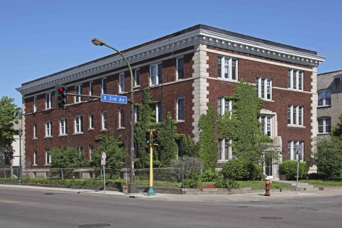 Exterior photograph of an historic Stevens Square apartment building, located at 1926 Third Avenue South in Minneapolis. UnitedHealth Group is providing $1.9 million in equity through a partnership with MEF to help transform the 100-year-old property into a new 19-unit affordable-housing community with support services for area homeless and people in need of permanent housing (Photo: Greg Page).