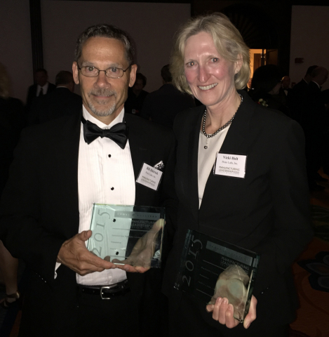 Proto Labs' President and CEO, Vicki Holt, and Proto Labs' VP of Global Marketing, Bill Dietrick, accepted the Manufacturer of the Year award at the Manufacturing Leadership Awards ceremony on June 4, 2015. (Photo: Business Wire)