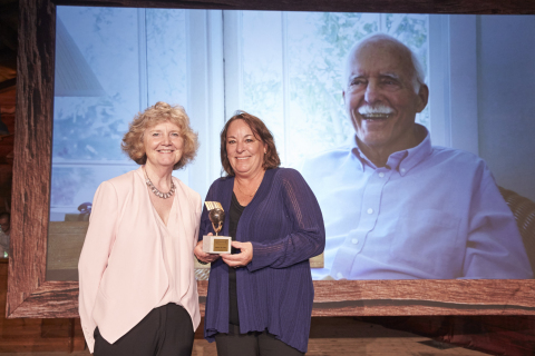 Sara Yerkes wife of Bill Yerkes and his daughter Kari Hummel pose with the SolarWorld Einstein Award in Munich, Germany which they accepted on behalf of Yerkes who has been described as the father of the modern solar industry. (Photo: Business Wire)