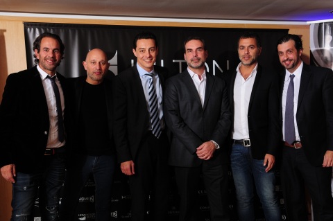 Left to Right: On June 18, 2015, Sebastian Janin and Daniel Souze, partners, Anselmo Buenos Aires; Eduardo Rodriguez Suarez, Director, Development – Southern Cone, Hilton Worldwide; Alejandro Schiavi, Chief of Cabinet, Argentina’s Ministry of Tourism; Fernando Janin, partner, Anselmo Buenos Aires; and Carlos Alonso, managing director, PKF hotelexperts Latin America gather to celebrate a signing agreement to add Anselmo Buenos Aires to the Hilton Worldwide’s Curio – A Collection by Hilton portfolio, the young brand’s first hotel in Latin America. (Photo: Business Wire) 
