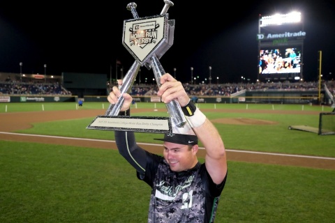 2015 TD Ameritrade College Home Run Derby winner Jeff Campbell of the University of North Dakota, hoists his trophy at the conclusion of the competition. Photo courtesy of Green Room Studios. (Photo: Business Wire)