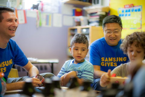 Employees like Gregory Lee, Samsung Electronics North America’s president and CEO, shown working with autistic children in New York during Samsung’s nationwide Day of Service in June, regularly give back to local organizations across the country who provide support to those in need. (Photo Credit: Margarita Corporan)