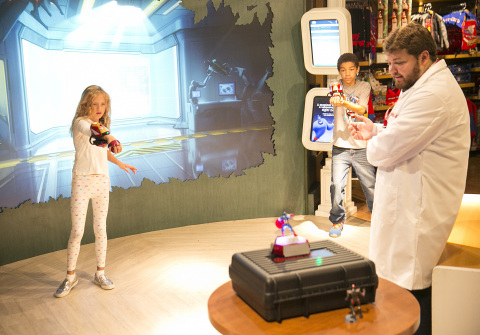 Kids playing with Playmation Marvel’s Avengers at Disney Store on Tuesday, July 7, 2015 in Glendale, Calif. as part of exclusive in-store experiences rolling out to select Disney Store locations nationwide and in Canada. Now available for pre-sale at key retailers online and participating Disney Store locations, Playmation is a new system of toys and wearables that uses smart technology to inspire kids to run around and use their imaginations, as they become the hero or heroine of stories from Marvel’s Avengers. (Photo by Colin Young-Wolff/Invision for Disney Consumer Products & Interactive Media/AP Images)