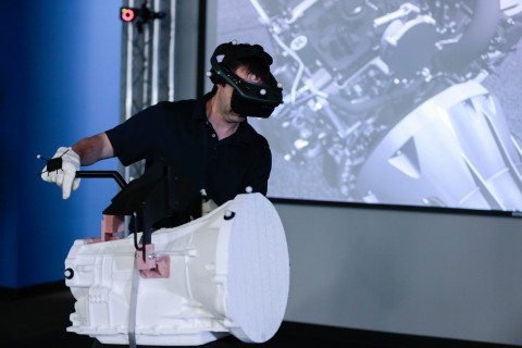 Ford Motor Company has reduced its production line injury rate by 70 percent since 2003 for its more than 50,000 ''industrial athletes'' by using virtual manufacturing and ergonomists. Immersive virtual reality uses a 23-camera motion-capture system and head-mounted display to virtually immerse an employee in a future workstation. Then, the employee's movements are evaluated to determine task feasibility and proficiency. (Photo: Business Wire)