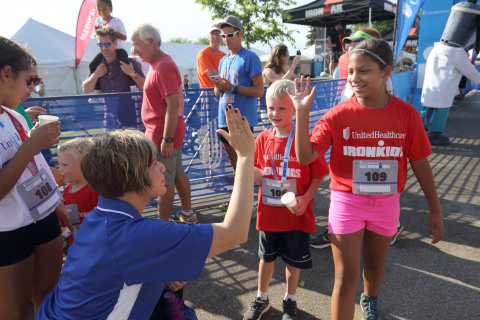 The first UnitedHealthcare IRONKIDS Racine Fun Run raced around North Beach Park today. IRONKIDS staff and Ginger Dzick, UnitedHealthcare Community Plan of Wisconsin vice president, handed out medals to nearly 100 local youth as they crossed the finish line. Source: Asher Imtiaz