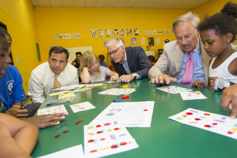 From left to right: Josh Kraft, Nicholas President and CEO of Boys and Girls Clubs of Boston, HMH Chief Marketing Officer John Dragoon and Chief Financial Officer Eric Shuman join Blue Hill Boys and Girls Club members for a “Summer Success Math Olympic Pentathlon.” (Photo: Business Wire)
