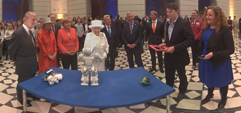 Panono executives meet with German Chancellor Angela Merkel and the Queen of England on the 50th Anniversary of the "Queen's Lecture" at the Technical University of Berlin. The Panono Camera was one of only two technology projects demonstrated at the event. (Photo: Business Wire)