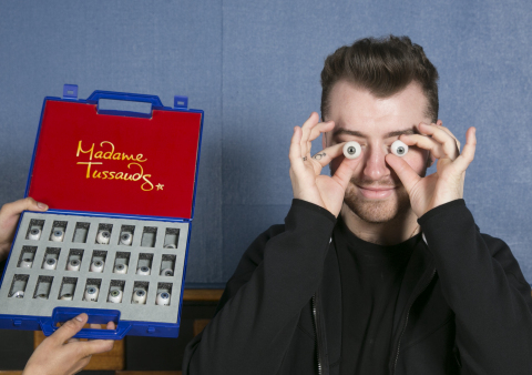 Sam Smith makes eyes at the camera during his Madame Tussauds sitting.(Photo: Business Wire)