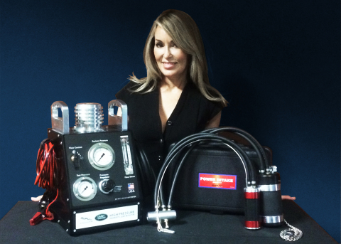 Executive Vice President, Alex Parker, with Redline's Award Winning Equipment. (Photo: Business Wire)