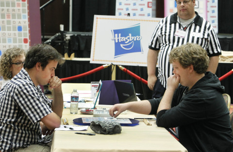 Matthew Tunnicliffe, of Ottawa, ON, and Jesse Day of Berkeley, Calif., concentrate on their SCRABBLE game at the 2015 North American SCRABBLE Championship on Wednesday, Aug. 5, 2015 in Reno, NV. (Photo: Business Wire)