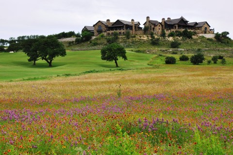 The Boot Ranch Clubhouse Village, a 55,000 sq. ft luxury clubhouse with member lodges, golf pro shop, numerous dining and social spaces, spa and outdoor spaces with long distance views. (Photo: Business Wire)