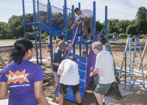 More than 100 Milford-area residents and local UnitedHealthcare employees built a new playground at the Woodruff Family YMCA, a Branch of the Central Connecticut Coast YMCA, in about six hours. The new 3,000-square-foot playground includes a playdozer, cozy cocoon, rocky ridge climber and other fun activities. This playground build is part of UnitedHealthcare's "Do Good. Live Well." program, an employee-volunteer initiative to help prevent obesity. The volunteers worked with KaBOOM!, a national nonprofit organization dedicated to bringing play to all kids. (Photo: Business Wire)