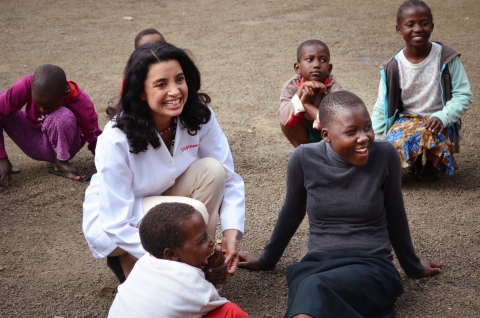 Walgreens pharmacist, Martha Morphonios, RPh, interacts with children in Tanzania, Africa as a part of the "Get a Shot. Give a Shot" campaign. (Photo: Business Wire)