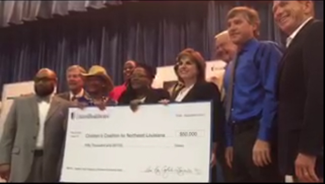 Children's Coalition for Northeast Louisiana Received a $50,000 grant from UnitedHealthcare. The donation was given during a check-presentation ceremony at Carroll High School. Guests and community leaders, including (L to R) Wossman High School Principal Sam Moore; State Sen. Francis Thompson; Monroe City Schools Board member Brenda Shelling; State Rep. Katrina Jackson; Children's Coalition for Northeast Louisiana representative Gatha Green; Carroll High School Principal Patrick Taylor; Dr. Ann Kay Logarbo, chief medical officer of UnitedHealthcare Community Plan of Louisiana; State Rep. Frank Hoffman; Monroe City Schools Superintendent Brent Vidrine; and State Sen. Mike Walsworth attended the event to see first-hand the program's impact in the community through presentations and a facility tour (Photo: Suhan Wallace).