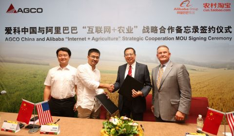 AGCO Executives sign memorandum of understanding with Alibaba Group's Taobao business division to start "Internet-plus-Agriculture" crossover program. (Photo: Business Wire)