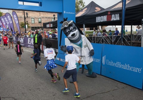 Nearly 200 local youth crossed the finish line at this morning's first UnitedHealthcare IRONKIDS Augusta Fun Run at the Augusta Convention Center. IRONKIDS staff, UnitedHealthcare mascot Dr. Health E. Hound, and Terence Christopher of UnitedHealthcare, cheered and handed out medals to all young athletes. For the first time in Georgia, IRONKIDS offered 1-mile and ¼-mile tracks for physically challenged youth athletes. (Photo Credit: Russell Kaye)