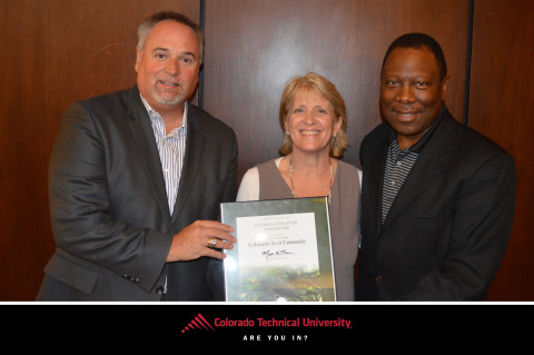 Dr. Connie Johnson accepting NUTN award on behalf of Colorado Technical University (Photo: Business Wire)