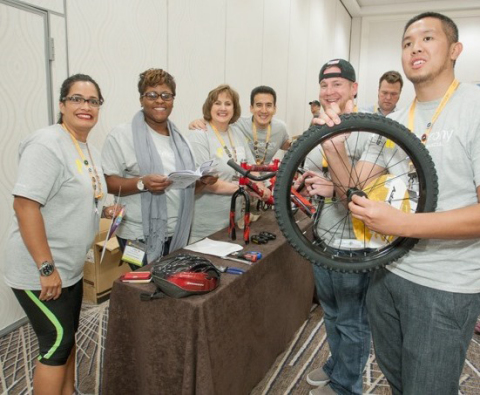 Synchrony Financial employees participate in a Build-A-Bike Workshop in Orlando to benefit children  ... 