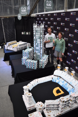 Bryan Berg, Guinness World Record holding “Cardstacker” and Dee Schlotter, senior color marketing manager, PPG Architectural Coatings, U.S. and Canada, stand next to “The City of Cards” in Pittsburgh, Pa. Constructed with more than 20,000 playing cards and “coated” with nearly 3,000 PPG PAINTS™ color swatches, the structures were built over the course of three days to unveil the PPG Paints 2016 Color of the Year, Paradise Found – a serious, aloe green – and 2016 color trends from PPG Paints, Pittsburgh’s hometown paint store. A true celebration of the city of Pittsburgh, “The City of Cards” features replicas of PPG Place, Heinz Field and PNC Park. (Photo: Business Wire)