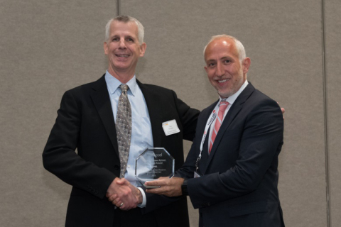 Nadim Yared, President and CEO, CVRx, Board Chairman, AdvaMed Accel congratulates winner Tom Ryan, CEO, Thermatome. Credit: AdvaMed 2015: The MedTech Conference
