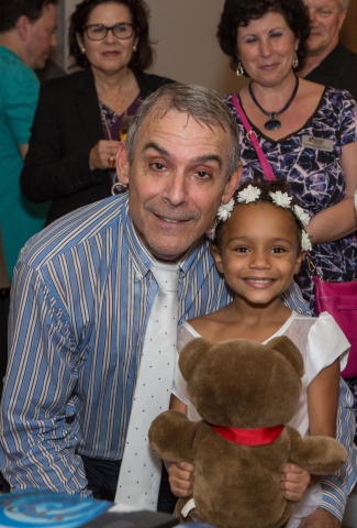 Thomas P. Severino, president/CEO of the Broward Education Foundation and eight-year-old Samara who is one of the students in the documentary and benefiting from the campaign. (Photo: Business Wire)