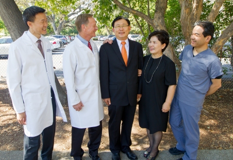 Adult congenital heart disease patient Sang Hee Yoon, center, and his wife, Min Wha Yoon, chat with Mr. Yoon's doctors, (L-R) George Lui, MD; Daniel Murphy, MD; and Katsuhide Maeda, MD. (Photo: Business Wire)
