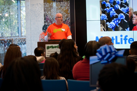 MetLife Chief Technology Officer Jim O'Donnell welcomes students during the second annual "MetLife Geek-A-Thon" where volunteers refurbished more than 400 computers for students in the North Carolina area. "By providing children access to state-of-the-art computers we can inspire the next Steve Jobs or Bill Gates here in the Triangle," said O'Donnell. (Photo: Business Wire)