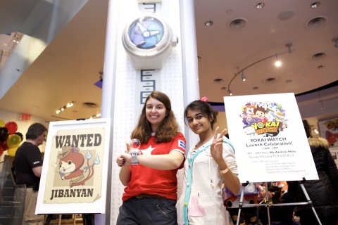 In this photo provided by Nintendo of America, fans pose with a larger-than-life replica of the Yo-Kai Watch at the launch celebration of the YO-KAI WATCH game for Nintendo 3DS at Nintendo World store on Nov. 7, 2015. Fans were treated to hands-on time with the game, appearances with costume character Jibanyan and a special autograph signing with Founder, President/CEO of LEVEL-5 Inc. Akihiro Hino.