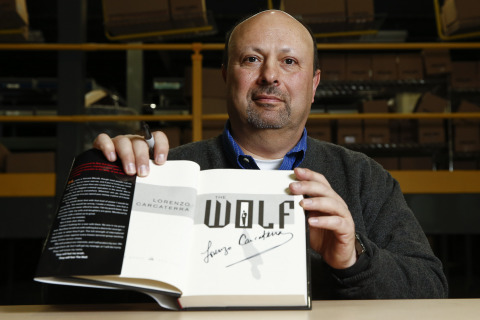 Bestselling crime author Lorenzo Carcaterra wrote a special note in a dozen of the thousands of copies of "The Wolf" that he signed for customers to find at Barnes & Noble on Black Friday (Jeff Zelevansky for Barnes & Noble).